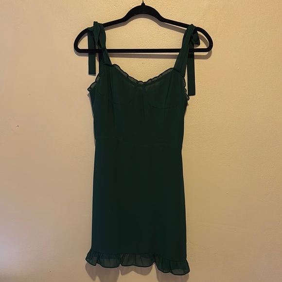 Green Sleeveless Dress with Ruffle Hem - Picture 1 of 3